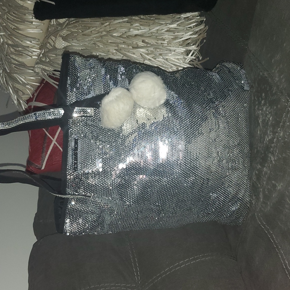 🛍Victoria Secert Shimmering Silver Tote with Pom Poms. Great Fall Favorite🛍